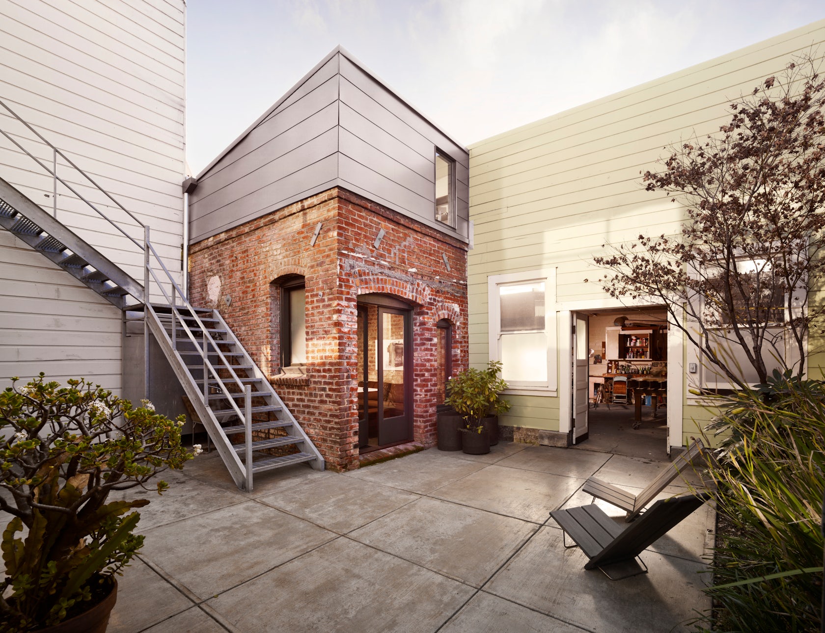 Brick House by Azevedo Design, Inc.