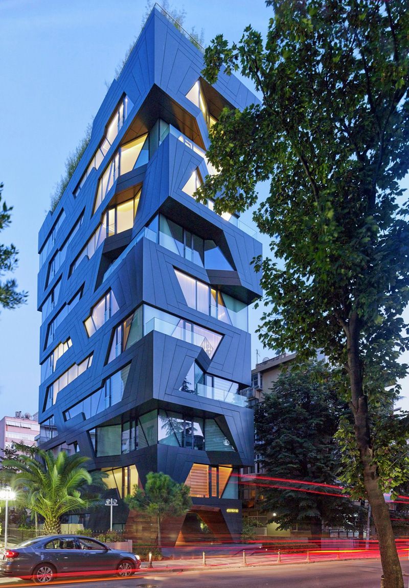 The Exterior Of This Apartment Building Is A Break From The Cookie-Cutter Buildings It's Surrounded By