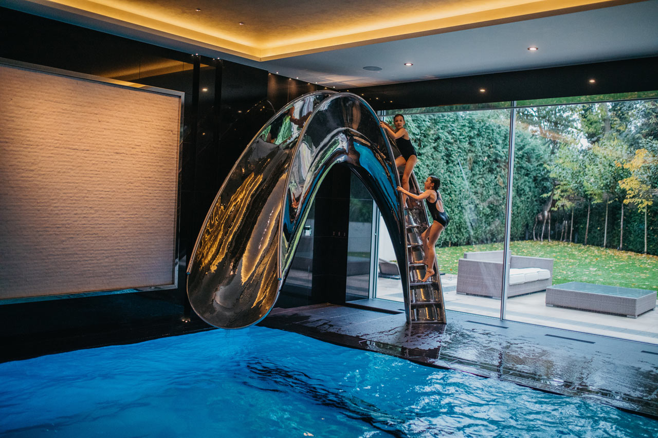 Sleek, Sculptural Water Slides for the Modern Pool