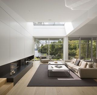 Modern living room in a lake house built into a grassy slope overlooking a secluded bay in Southern Quebec, Canada [OS] [2000×1955]