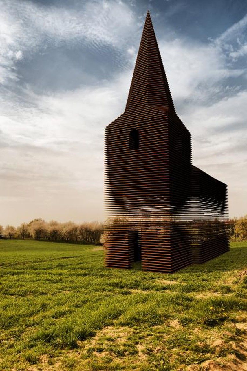 Steel church fades into the Belgian landscape