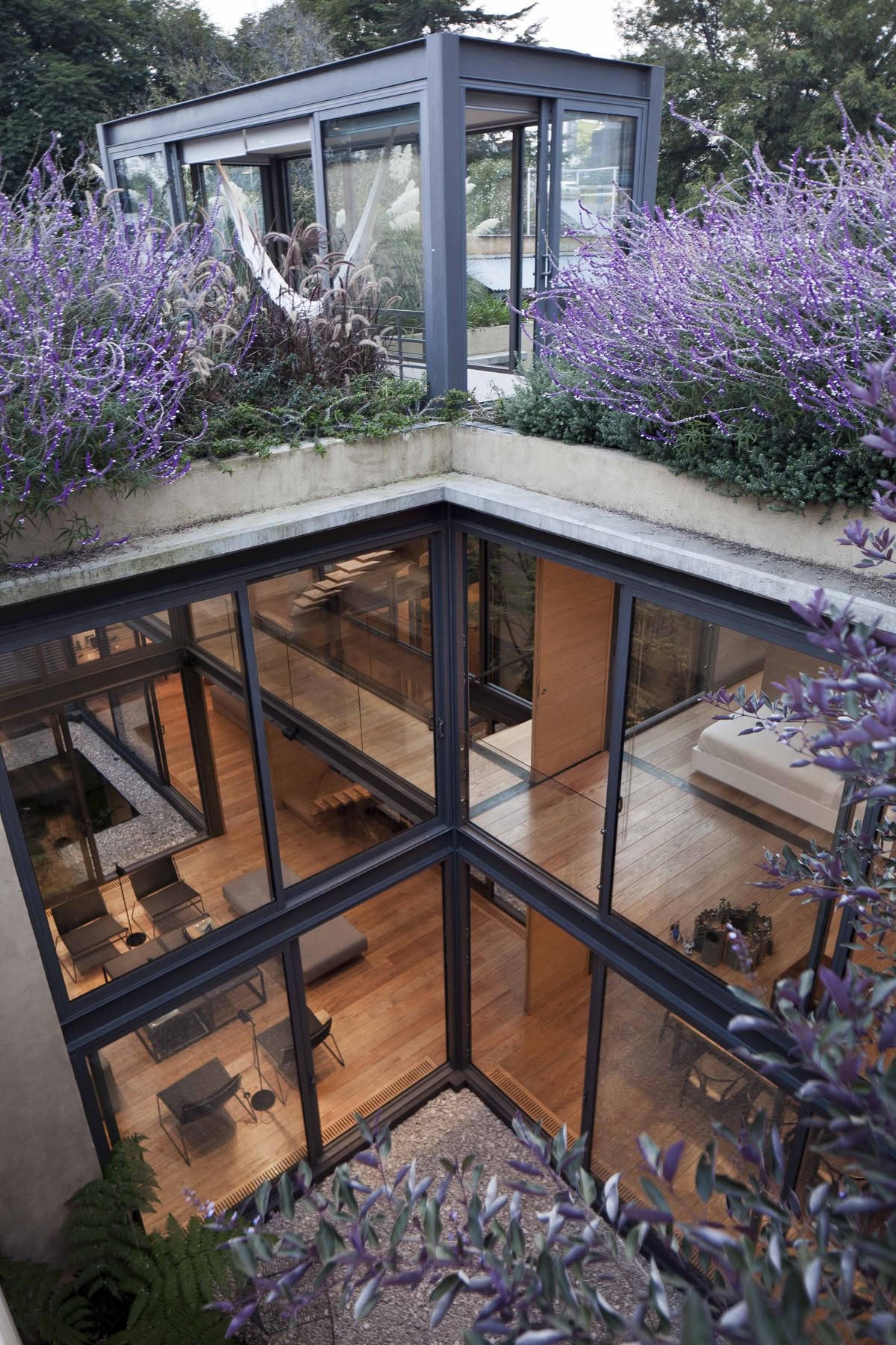 House with Four Courtyards / Andrés Stebelski Arquitecto