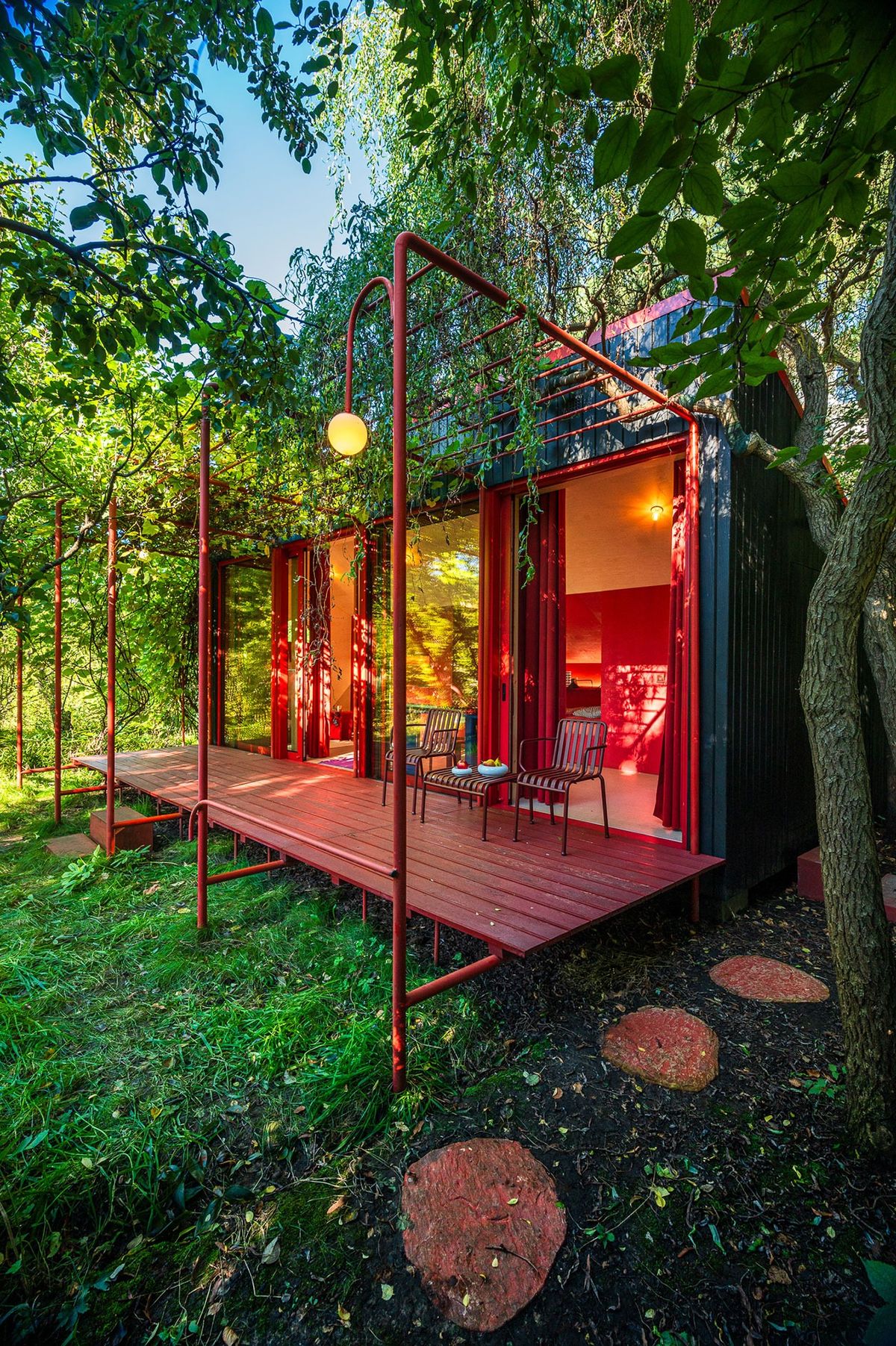 House of Color: A Vibrant Tiny Cottage in a Warsaw Garden